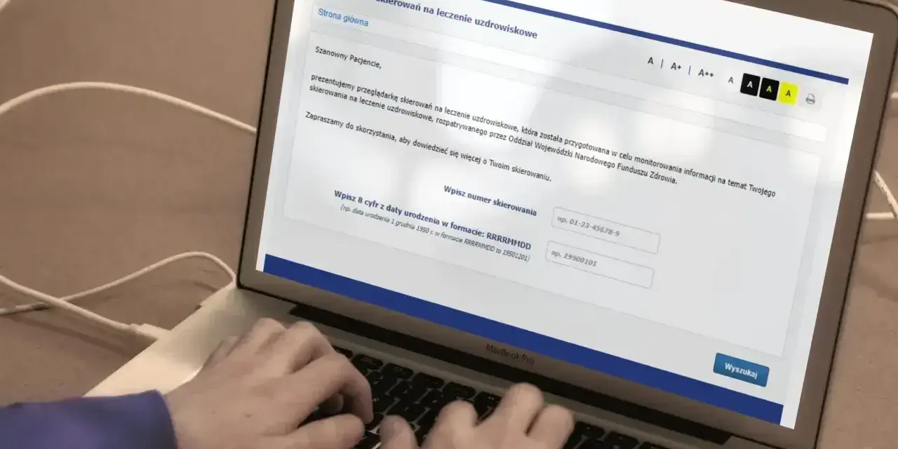 Laptop z otwartą stroną NFZ do wyszukiwania skierowań na leczenie uzdrowiskowe.
