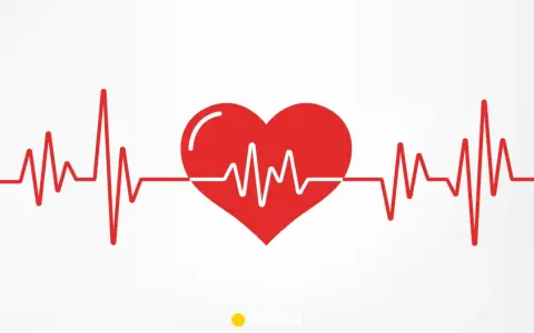 Czerwone serce z linią EKG na białym tle.